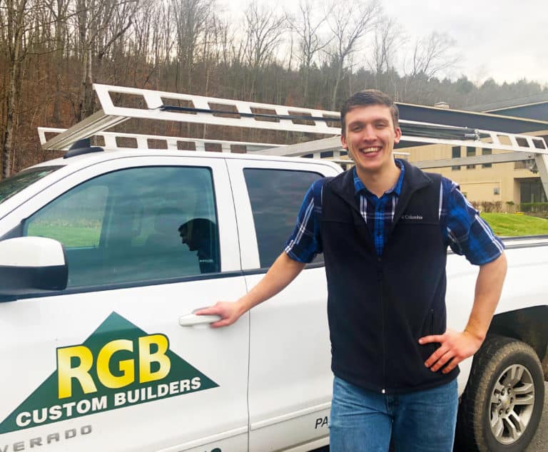 Sam posed next to RGB truck